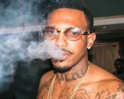 Trouble (rapper) smoking